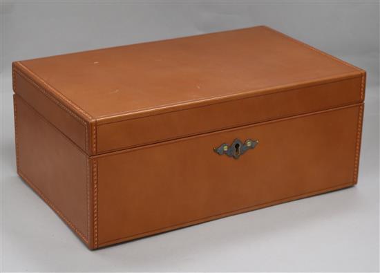 A stitched leather covered humidor